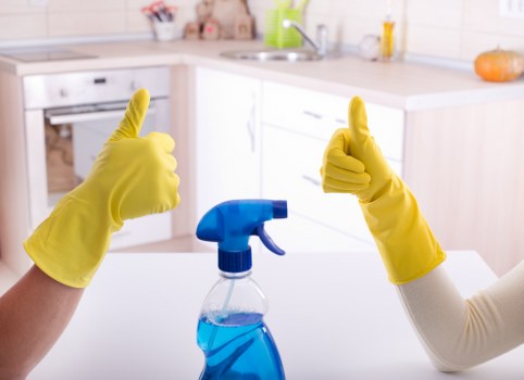 Professional cleaning team working in E14 building access area