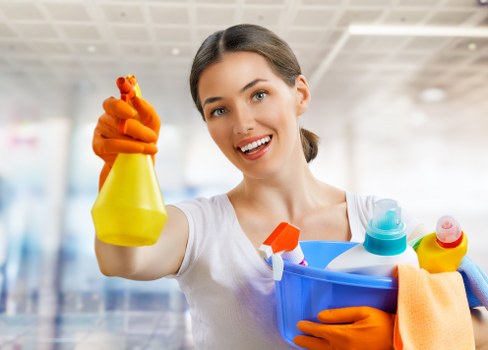 Local cleaner restoring a hard floor in a Canary Wharf office space