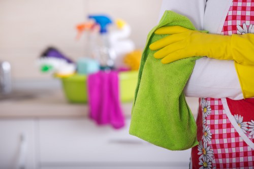 Local cleaner preparing a residential property in E14
